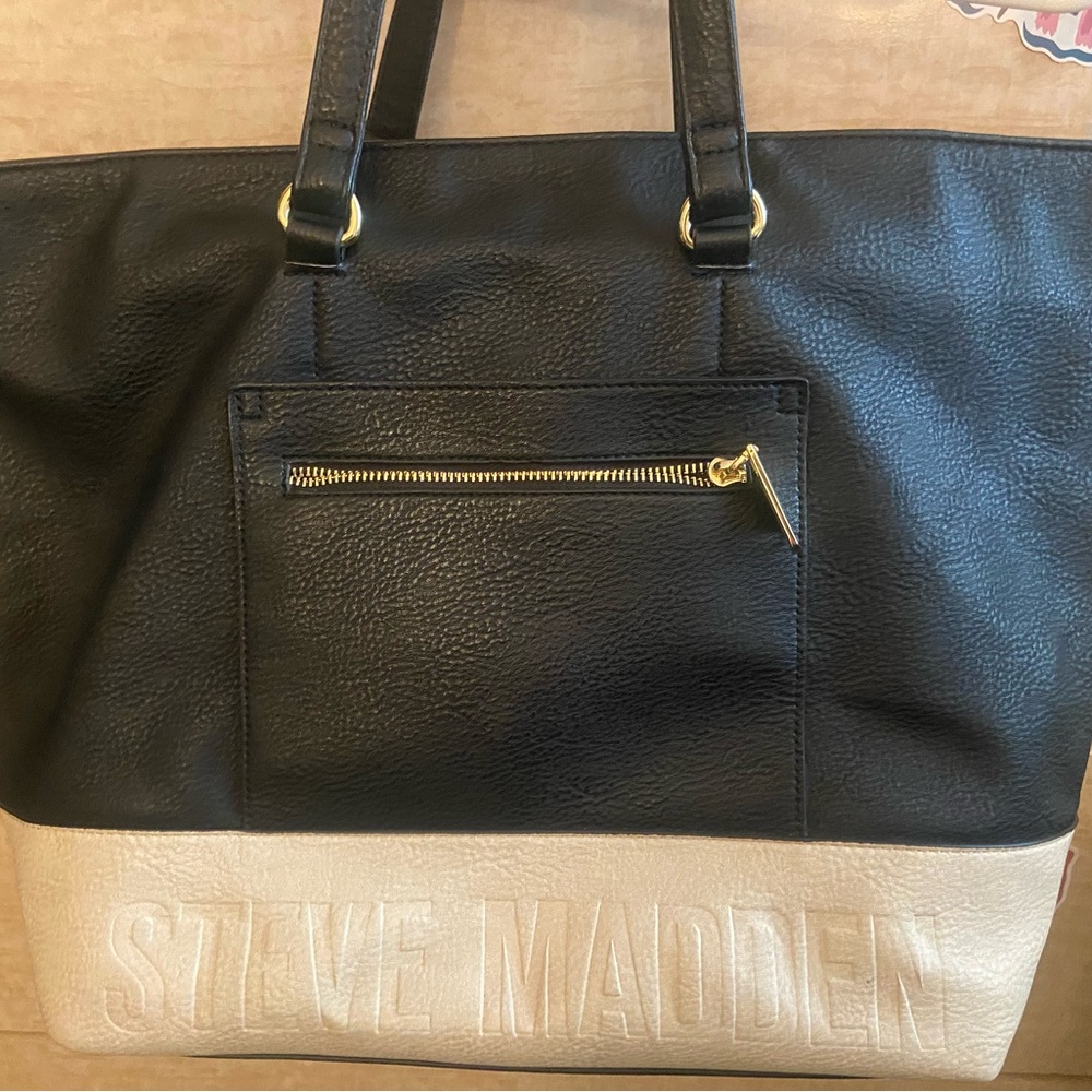 large black and white bag.  Used, with a few marks on bottom
